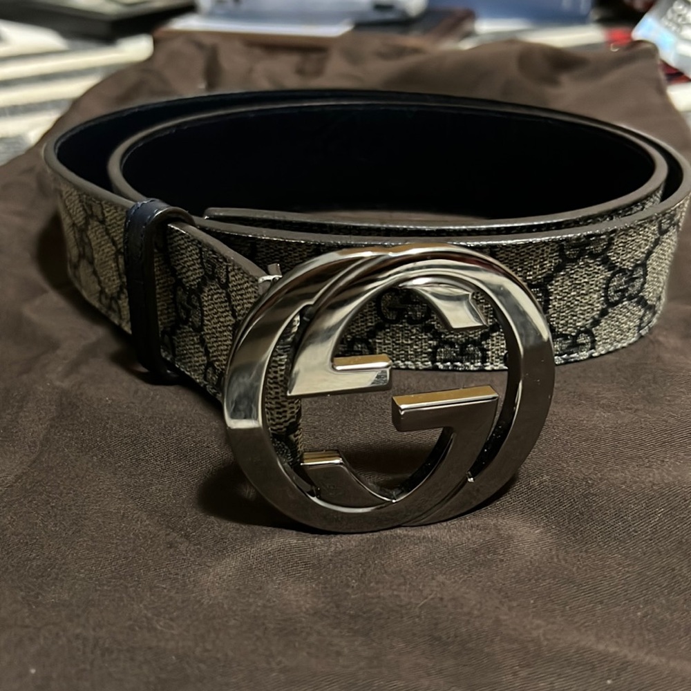 Gucci monogram belt with silver large buckle. Navy leather inside, size 90-36